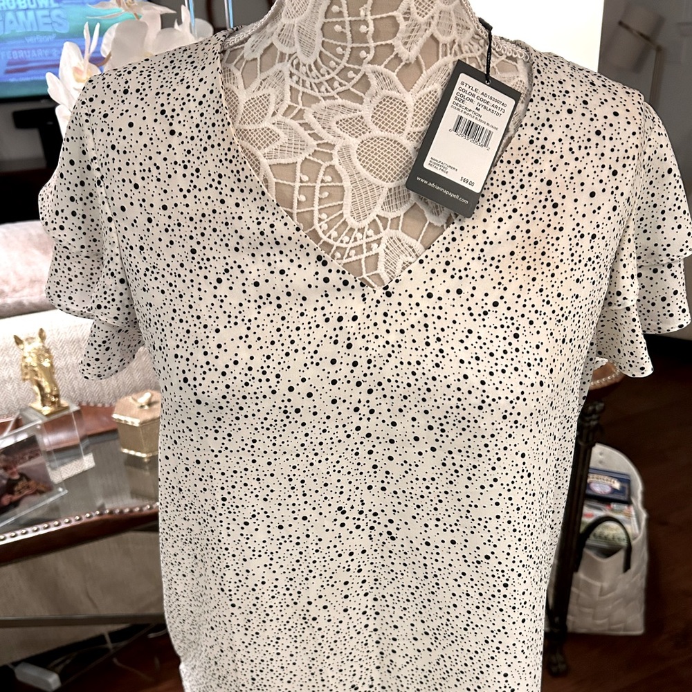 NWT double ruffle sleeve blouse in black and white. Size Med, by Adrianna Pappel